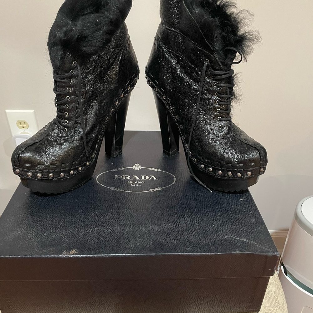 Prada boots worn only once! Great buy at $550.00! 4 nice heels and very comfy